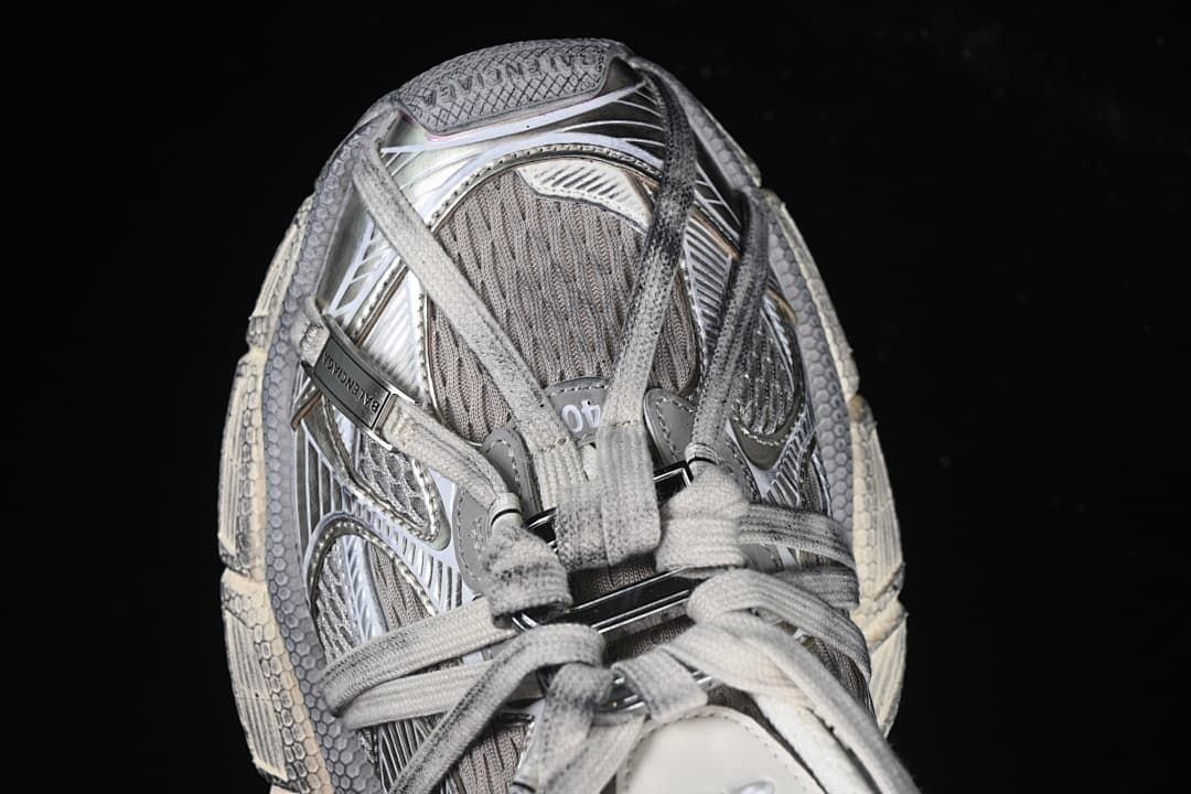 Top view of the sneaker showing its laces and layered upper