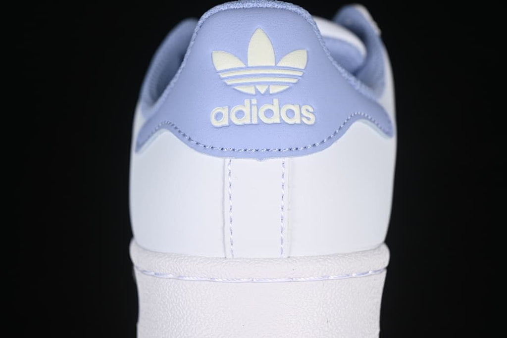 Rear view showing the lavender heel tab and adidas Trefoil branding
