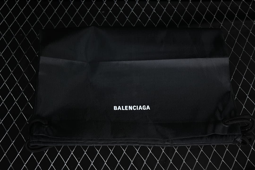 Black Balenciaga-branded drawstring shoe bag
