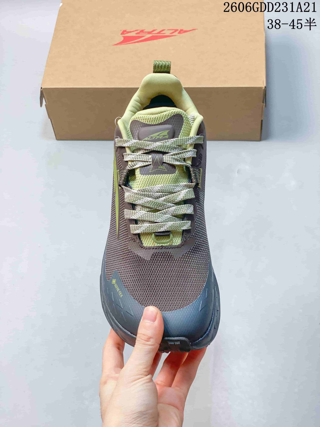 Top view of the trail shoe showing the tongue, laces, and toe area