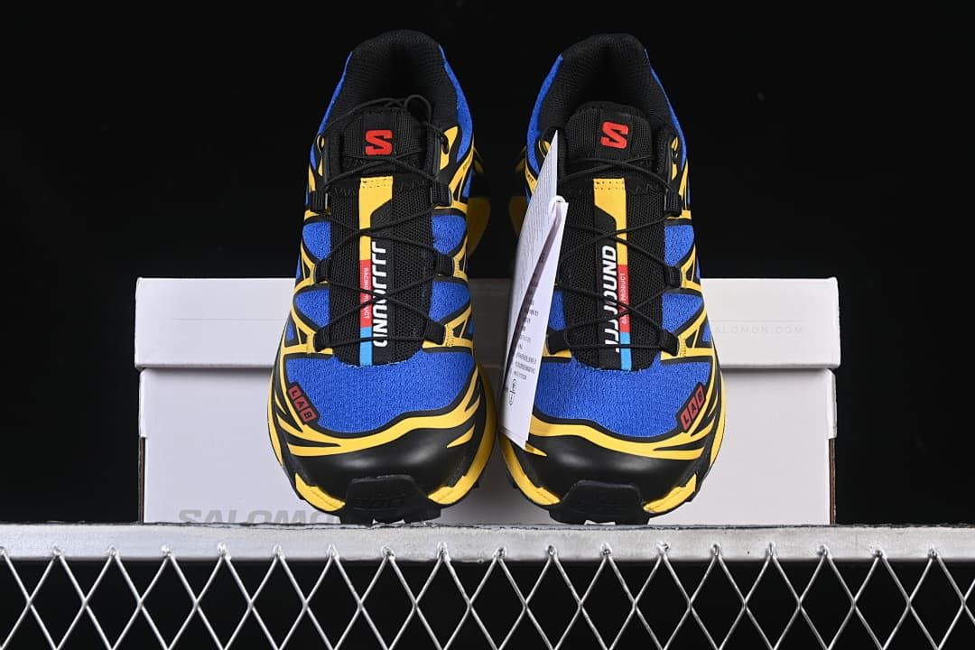 Front view of both sneakers resting on the box
