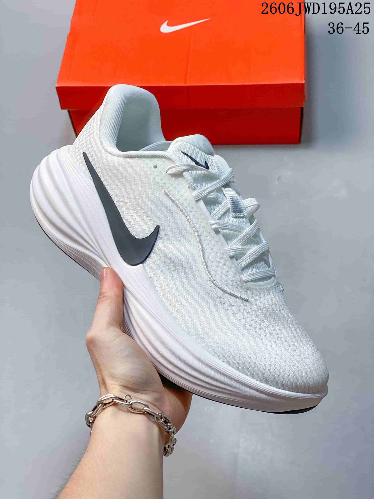 White Nike Pegasus-style running shoe with a dark side Swoosh and sculpted white midsole.