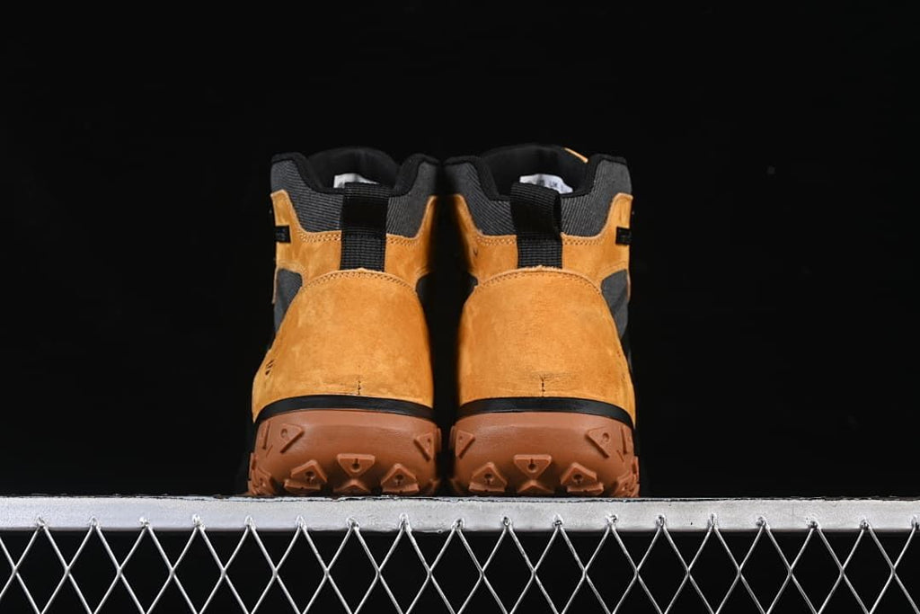 Rear view of the pair showing the heels and outsoles