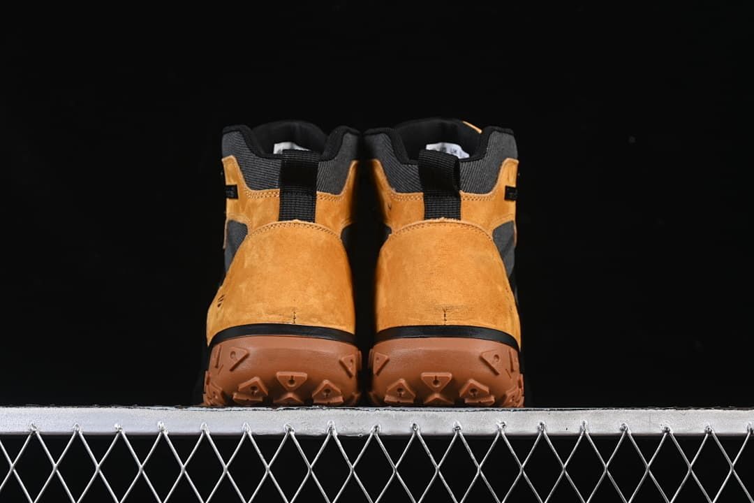 Rear view of the pair showing the heels and outsoles