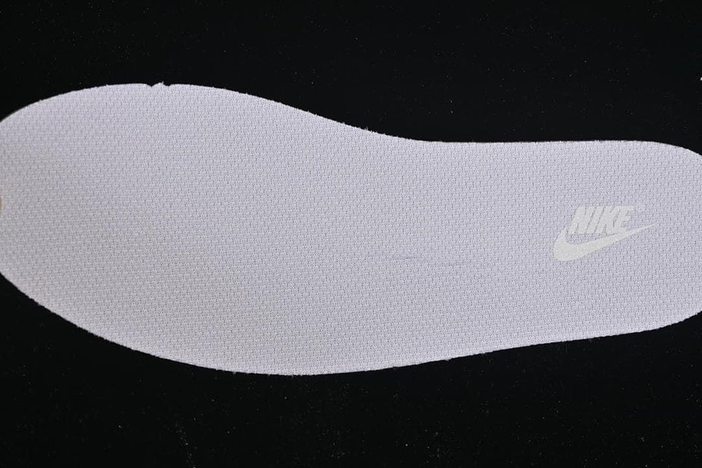 Textured insole with a visible Nike logo.