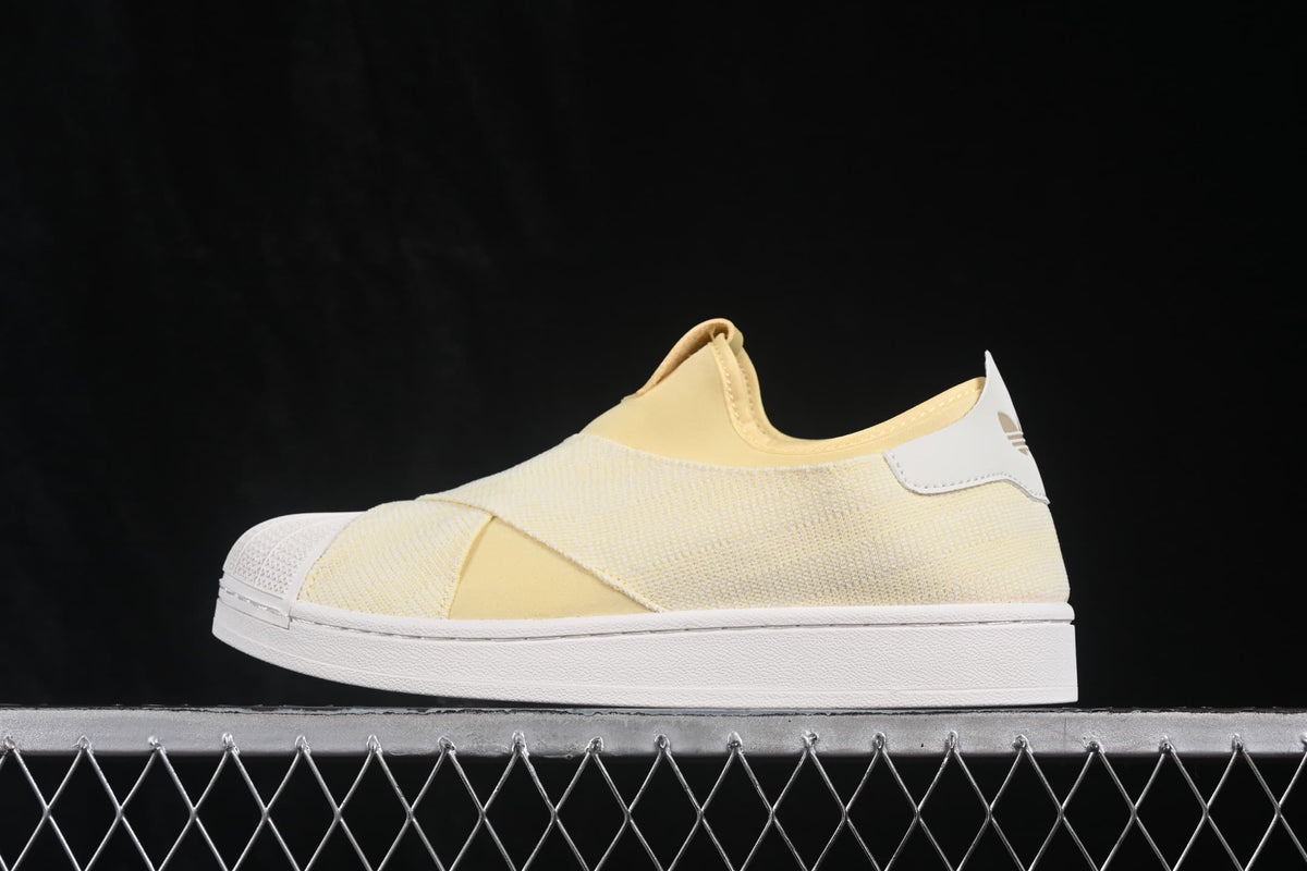 Side profile of the cream and white adidas Superstar II Slip-On sneaker.