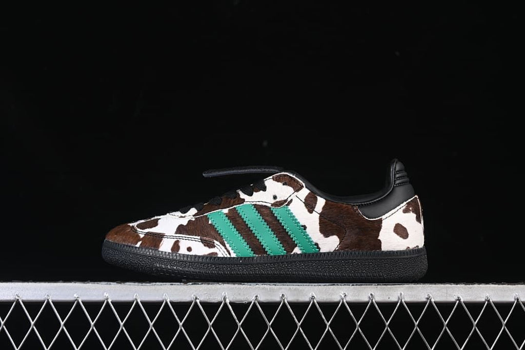 Side view of adidas Samba LT JS3930 sneakers with brown-and-white cow print, green stripes and black sole