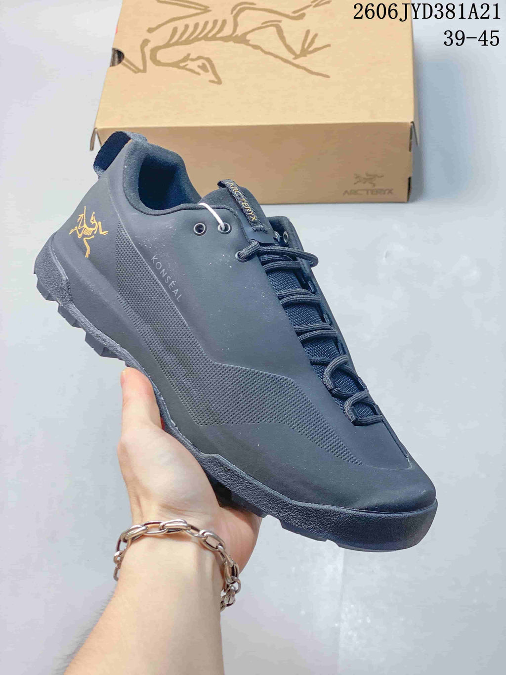 Dark gray Arc'teryx Konseal shoe with a black outsole and lace-up closure