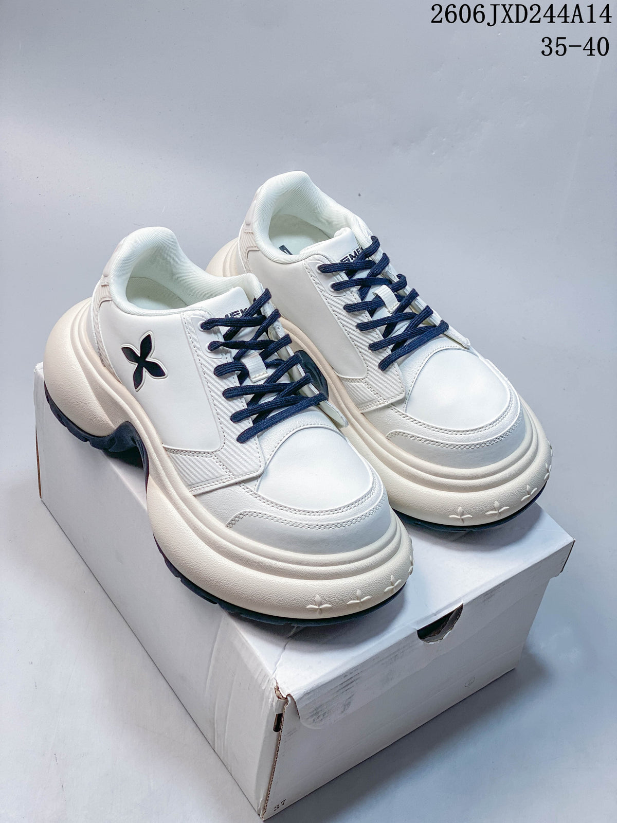 Pair of white SMFK sneakers with navy laces, side emblems, and chunky soles; image overlay shows code 2606JXD244A14 and sizes 35–40.