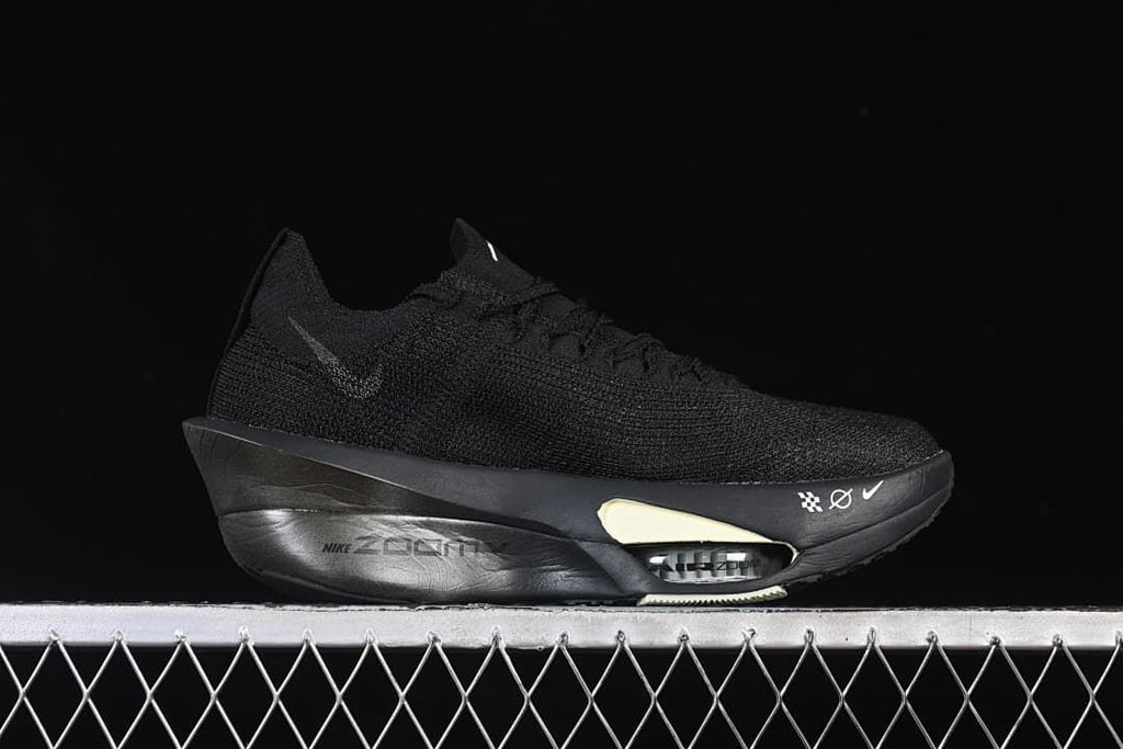 Side profile showing the black upper, sculpted sole, and Zoom Air unit