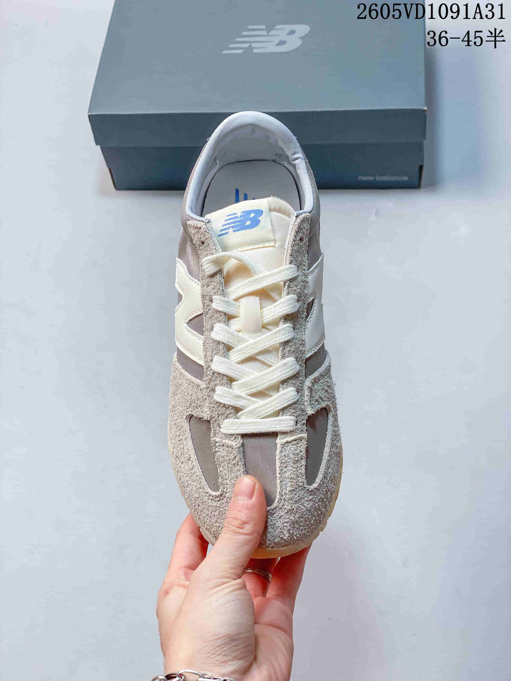 Front view showing the laces and contrasting side logos