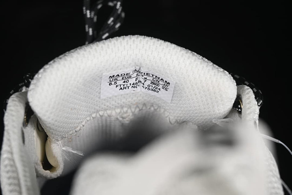 Close-up of the shoe's interior size and manufacturing label