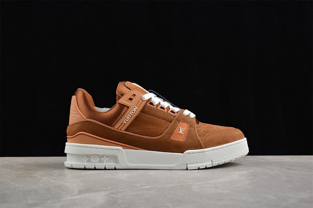 Opposite side profile of a brown LV Trainer sneaker with white sole