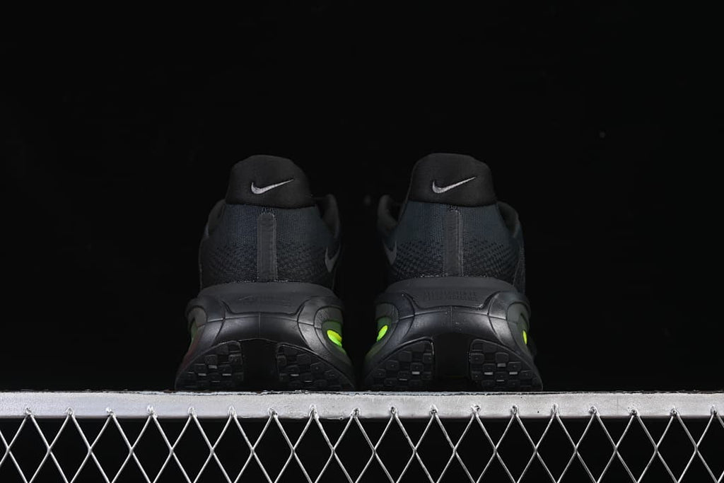 Rear view of the pair showing the heels and outsole details.