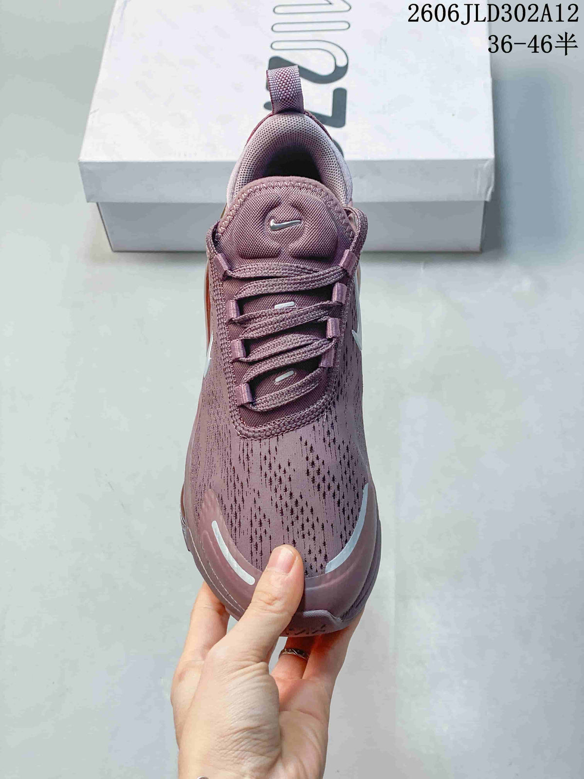 Top view of a mauve Nike Air Max 270 sneaker with lace-up closure