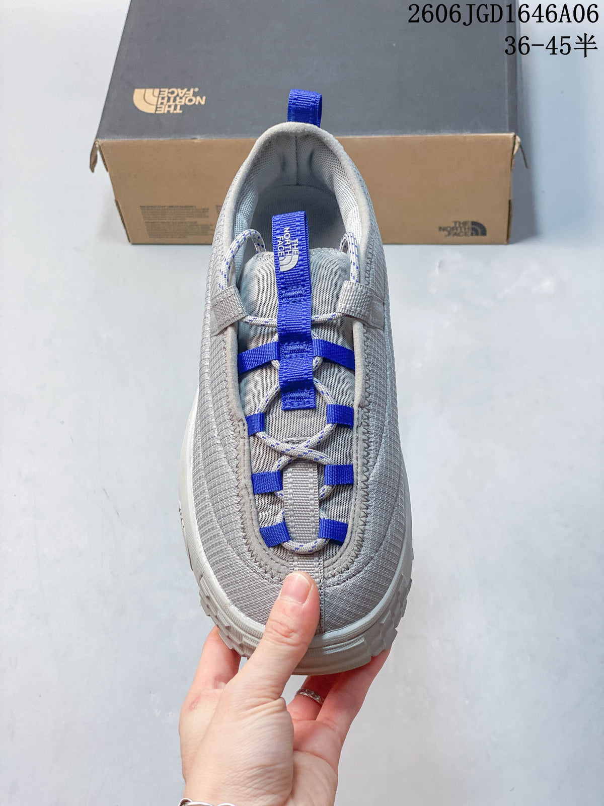 Top view showing the cord lacing detail and blue accents.