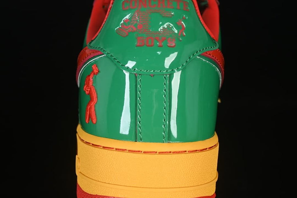 Rear view showing green heel panels and decorative graphics