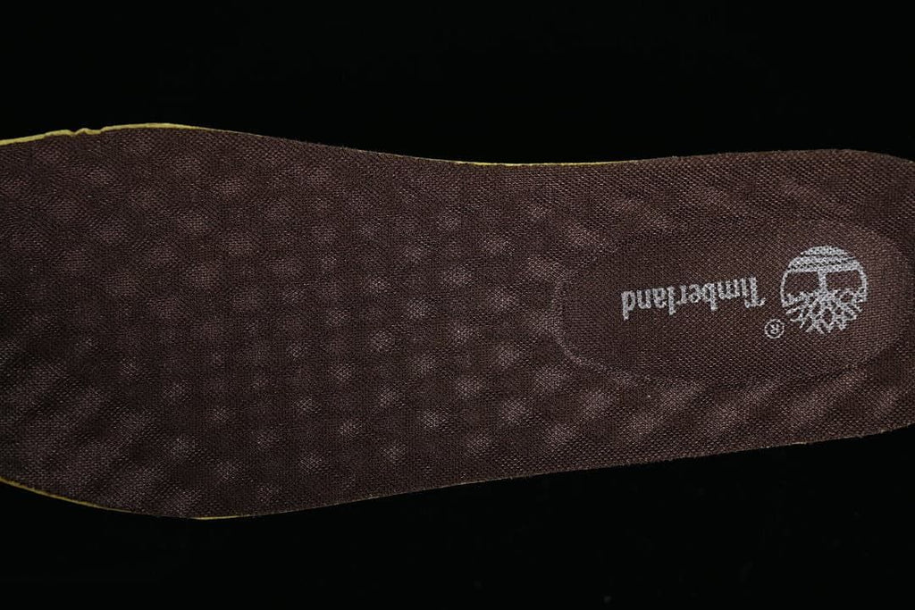 Close-up of the dark branded insole