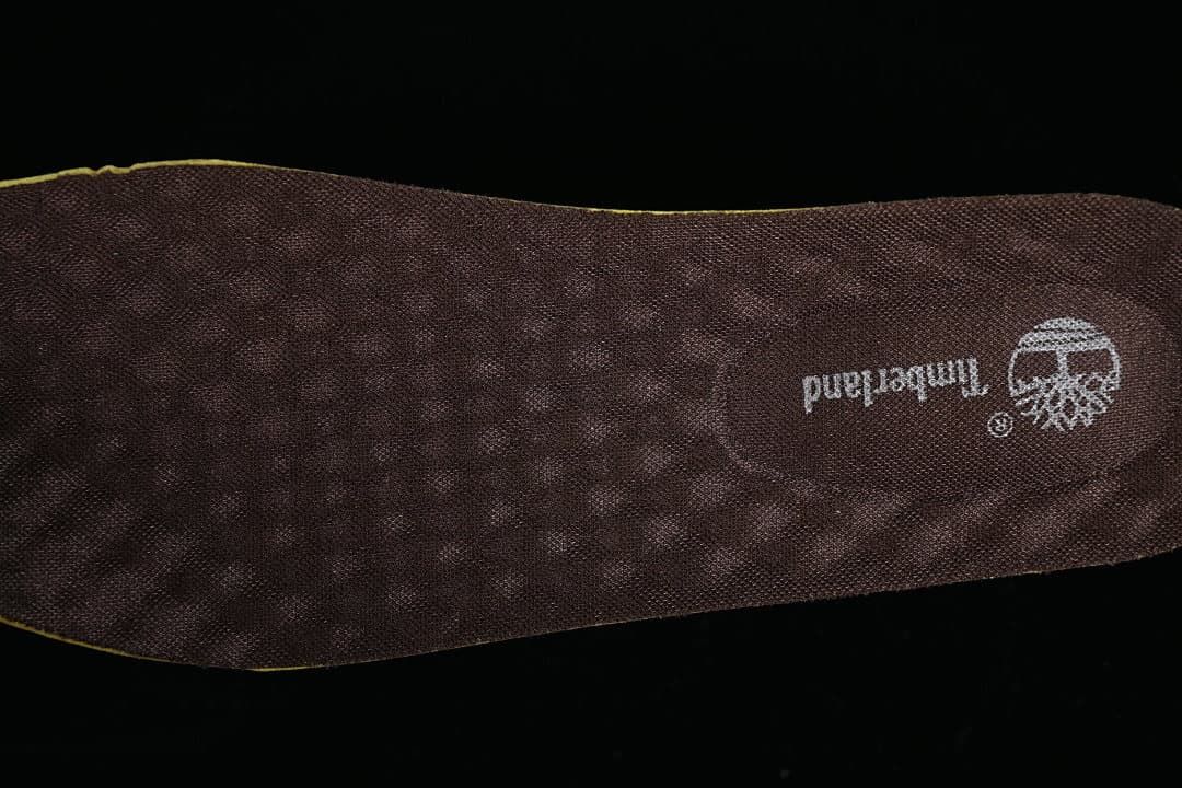Close-up of the dark branded insole