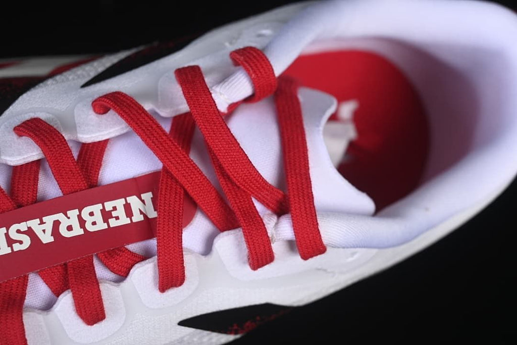Close-up of red laces and the tongue area