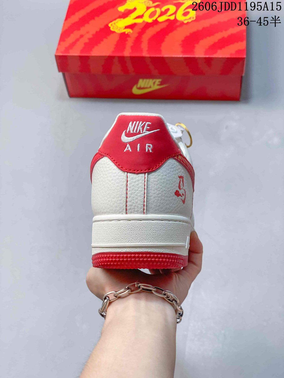 Rear view of the white and red Nike Air Force 1 Low showing heel branding and graphic detail