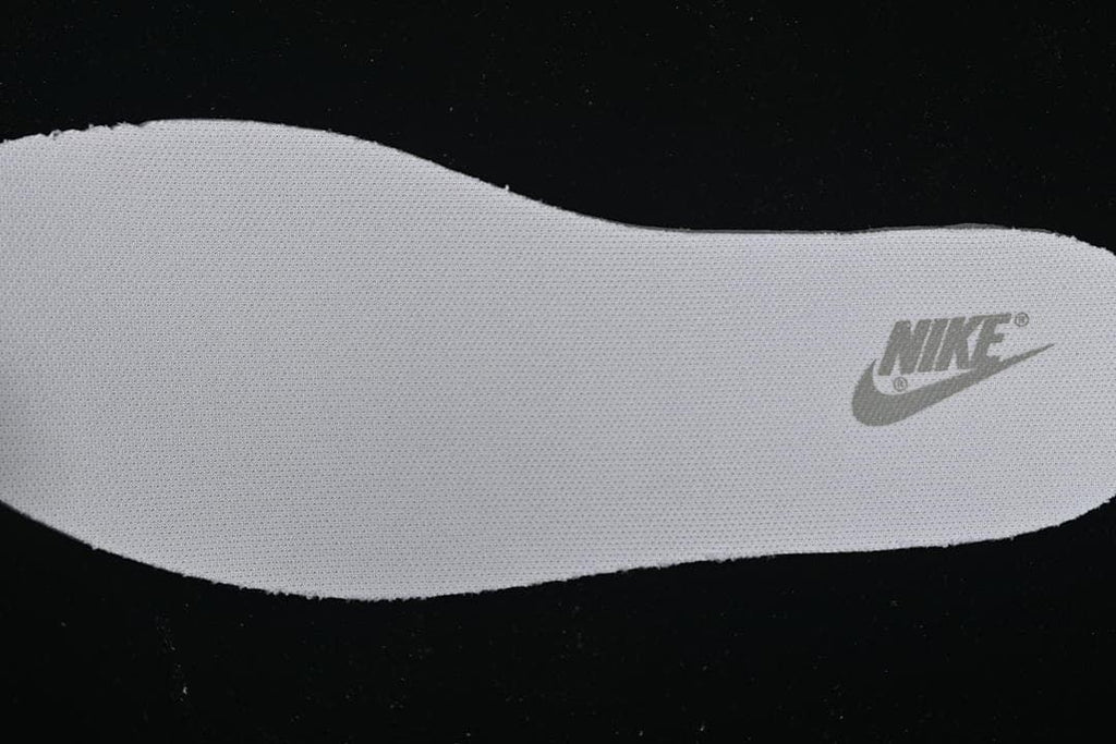 Close-up of the white insole with a grey logo