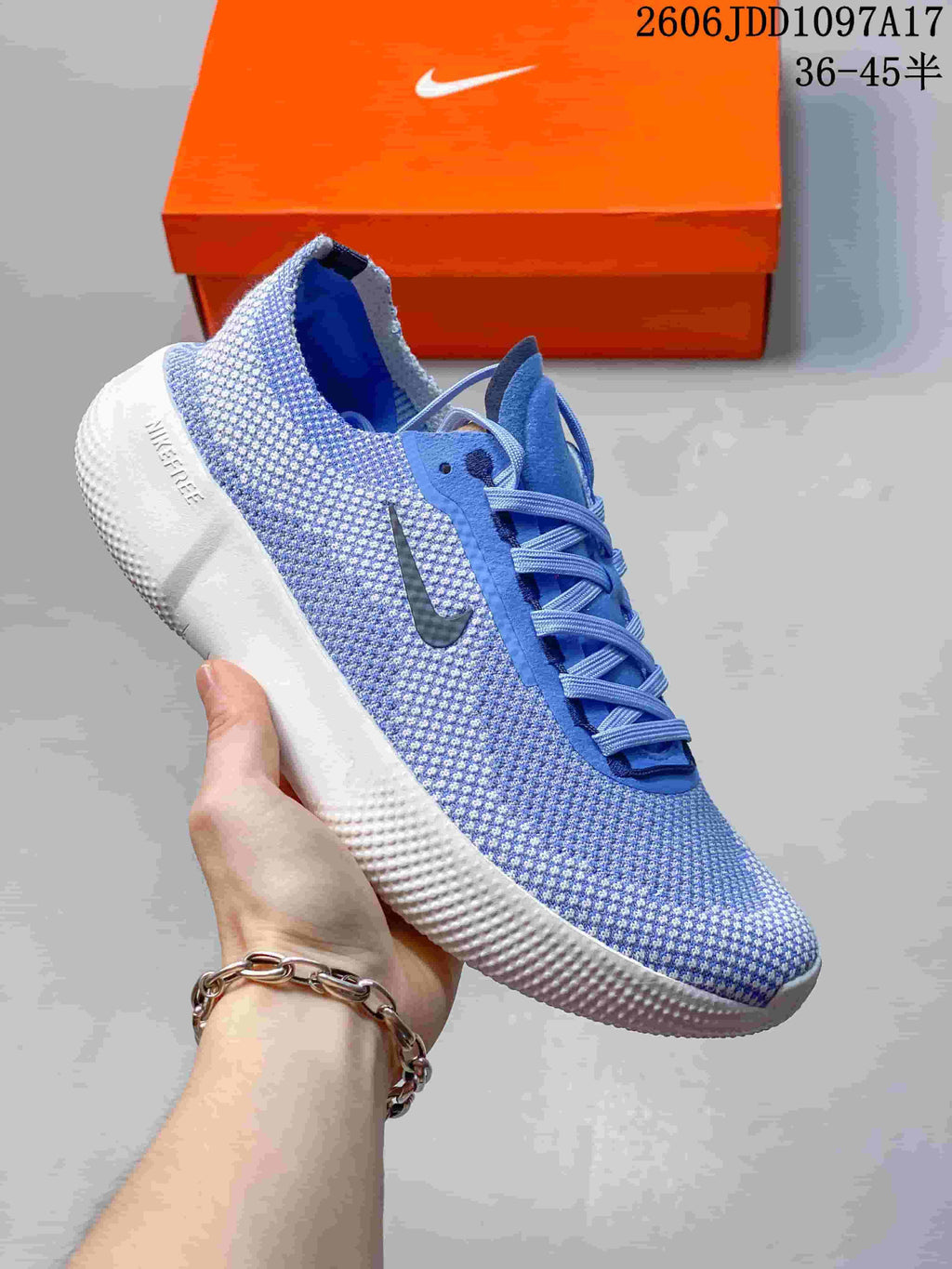 Blue Nike Free 2025 low-top shoe with a dark Swoosh and white sole.