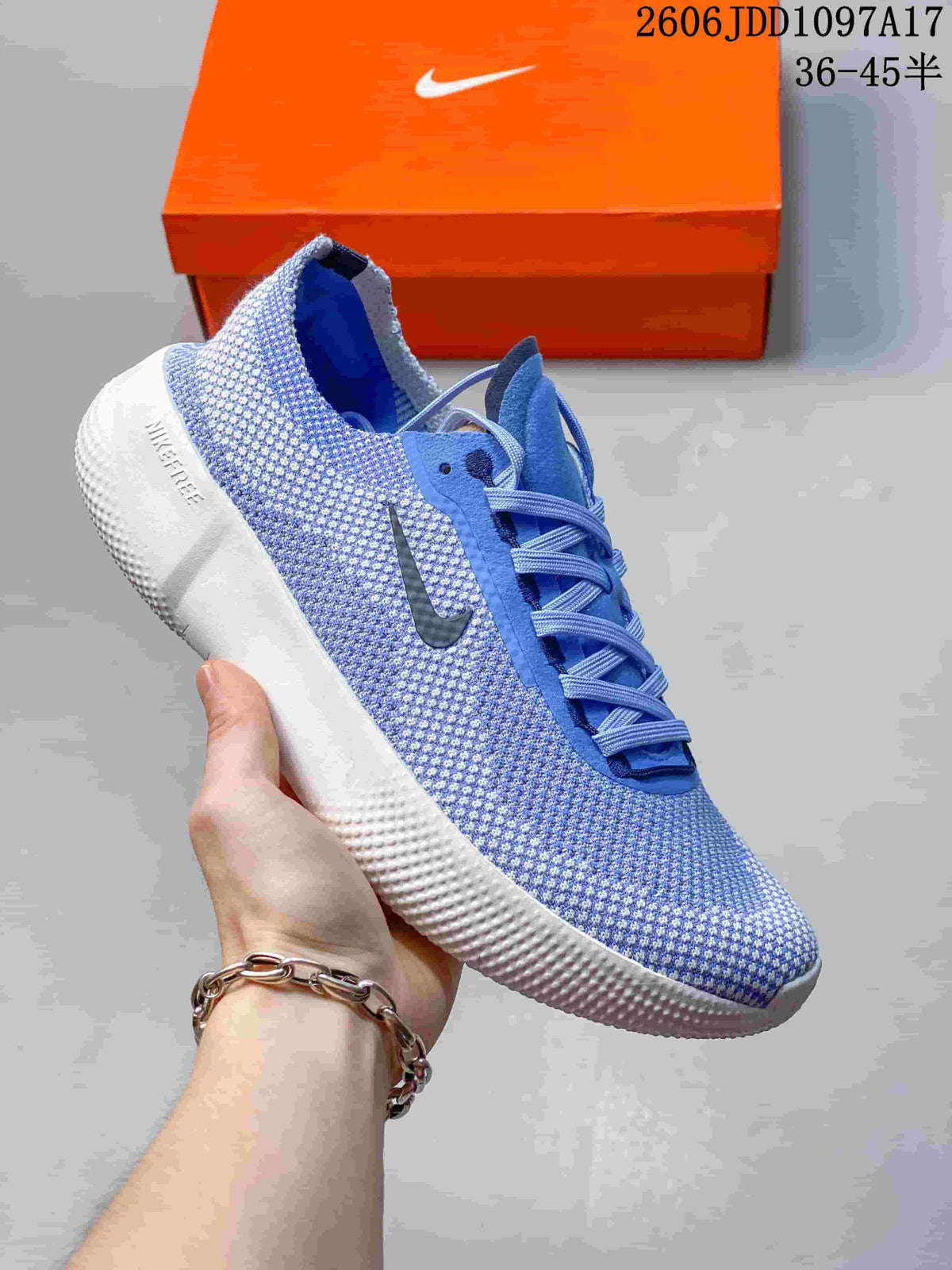 Blue Nike Free 2025 low-top shoe with a dark Swoosh and white sole.