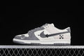 Side view of gray and white low-top sneakers with patterned laces and a layered side graphic