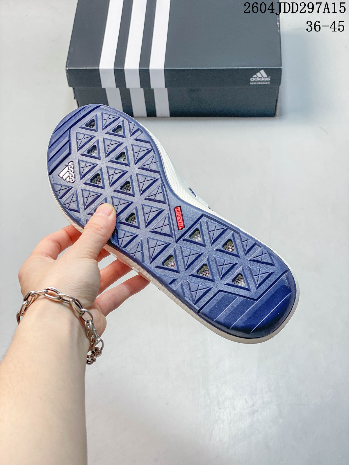 Outsole view showing the patterned tread and perforations