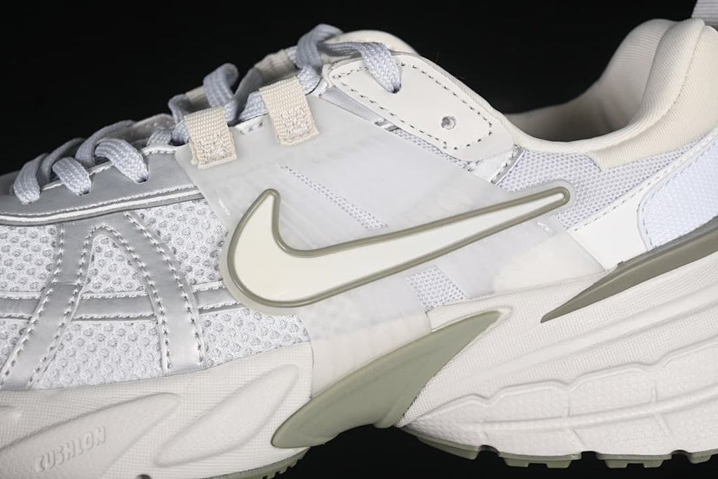 Close-up of the sneaker side panel, Swoosh and layered construction