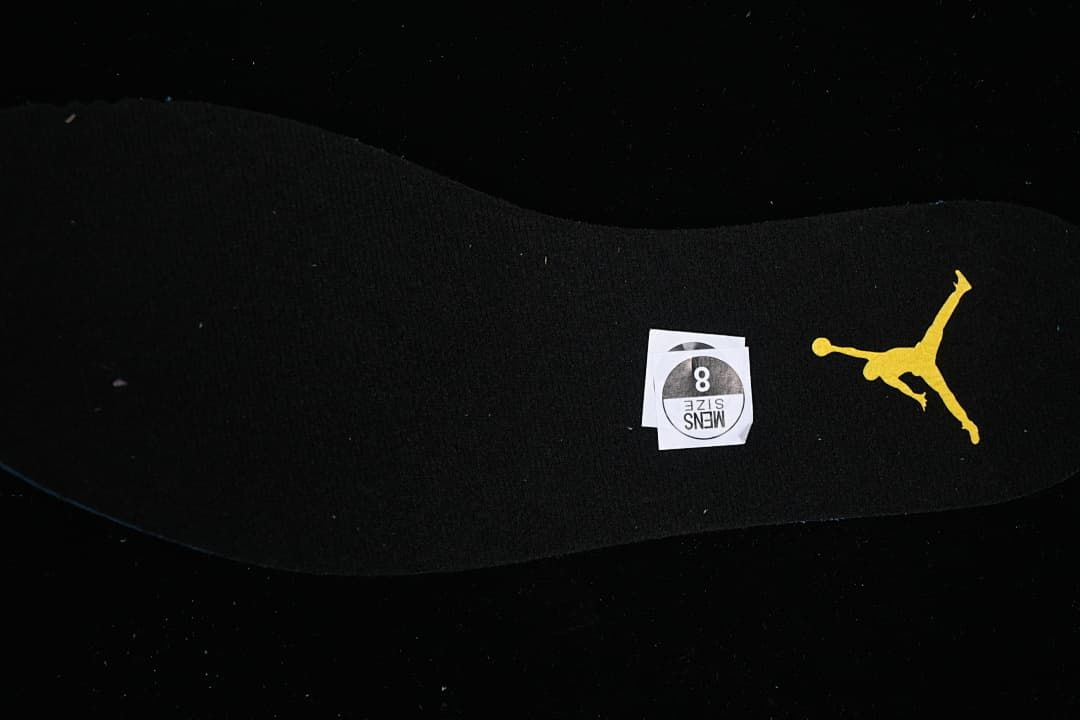 Black insole with gold Jumpman logo and size 8 sticker