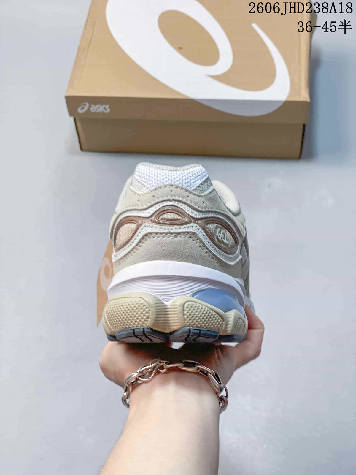 Rear view showing the heel and layered sole of the sneaker