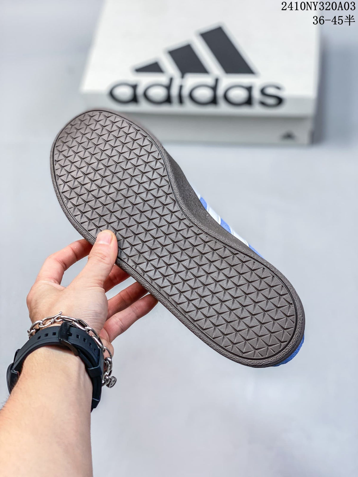 Close-up of the dark brown outsole with a geometric tread pattern