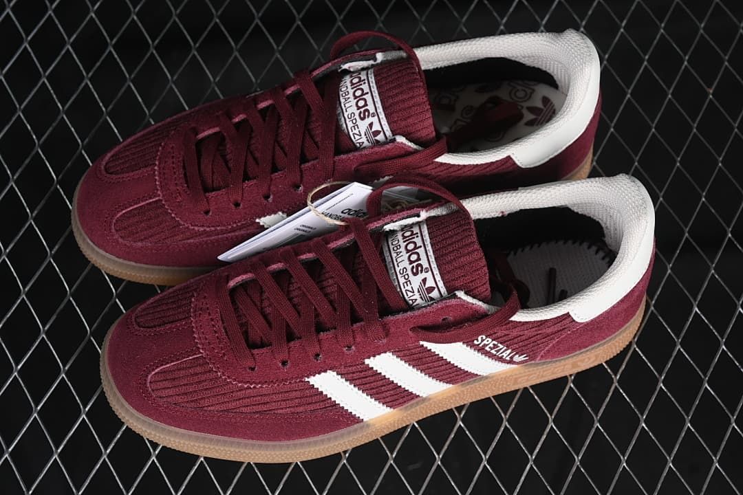 Pair of burgundy Handball Spezial sneakers shown from above