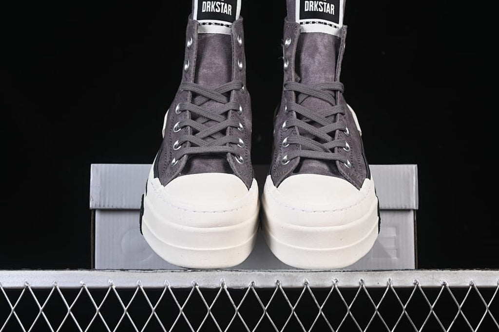 Front view of the pair showing the high-top shape and platform soles.