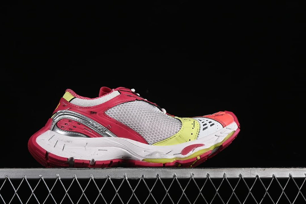 Side profile highlighting the mesh panels, colorful accents, and thick white midsole