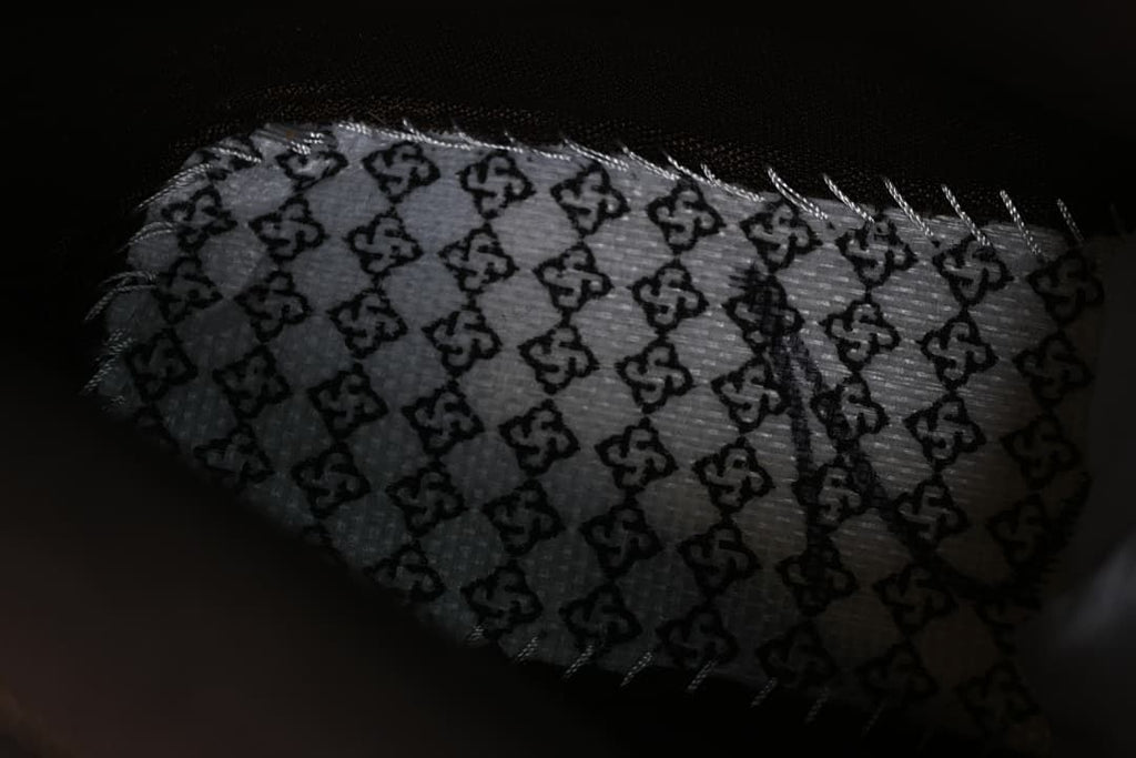 Close-up of the boot's patterned wrapping material