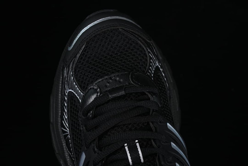 Top view of the sneaker's mesh-look toe and lace-up front