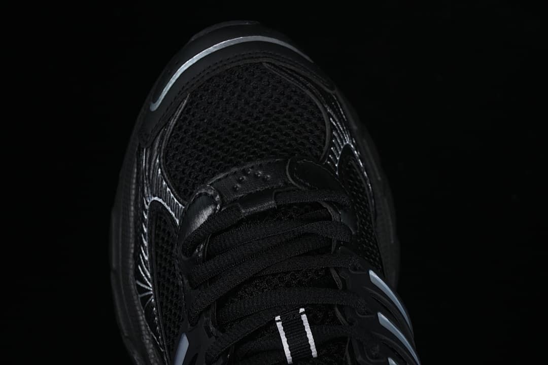 Top view of the sneaker's mesh-look toe and lace-up front