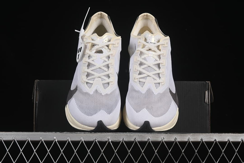 Front view of the pair showing the toe shape and lacing