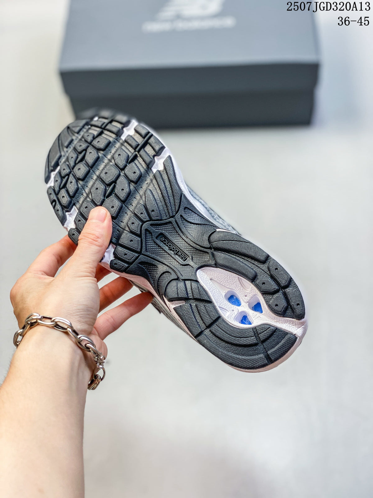 Underside view showing the patterned outsole of a New Balance 740 sneaker