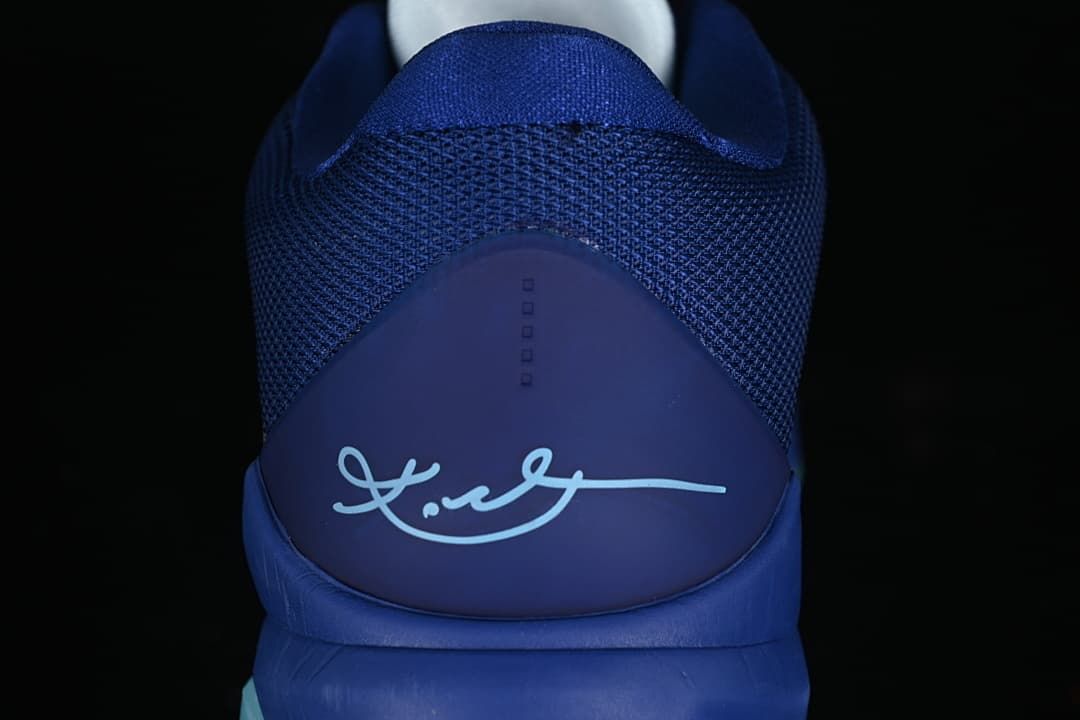 Rear view of the shoe showing mesh collar and Kobe signature