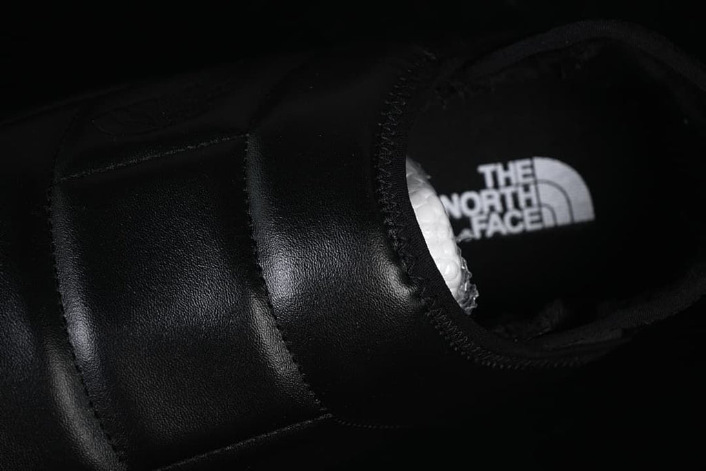 Top view of the mule opening and branded footbed.