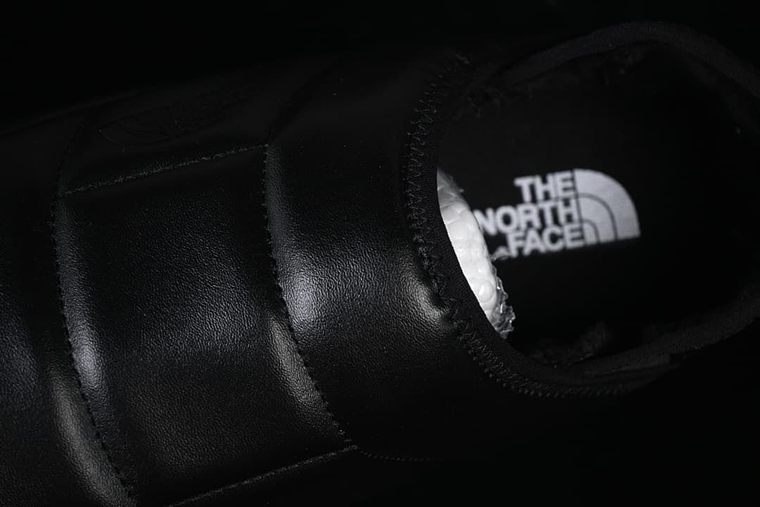 Top view of the mule opening and branded footbed.