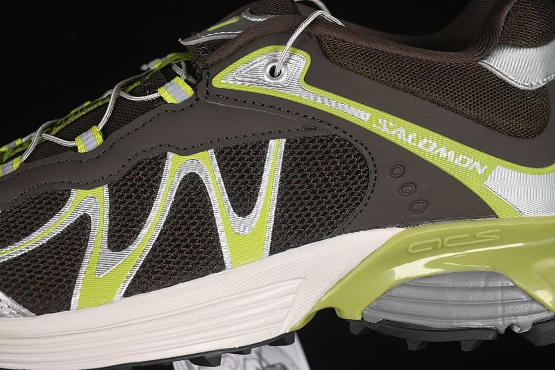 Close-up of the sneaker’s mesh upper, side overlays, and midsole