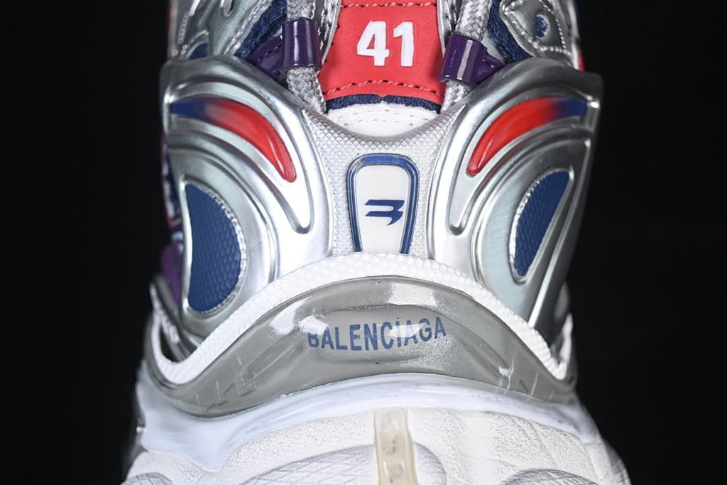 Rear view of the sneaker with sculpted silver and red heel details