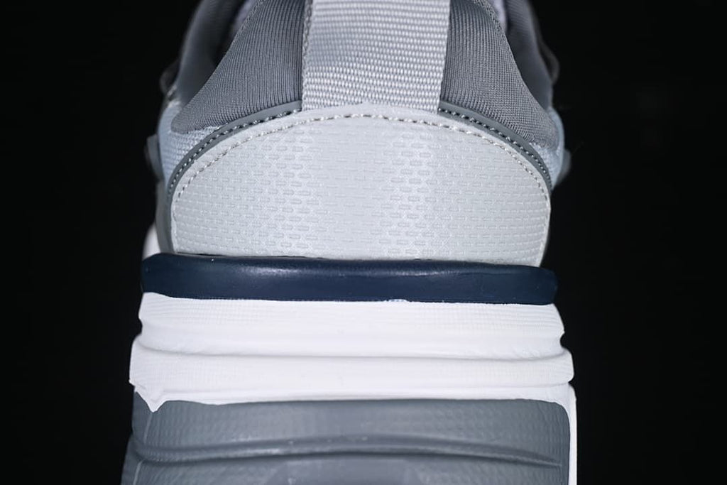 Rear view showing the heel pull tab and layered sole