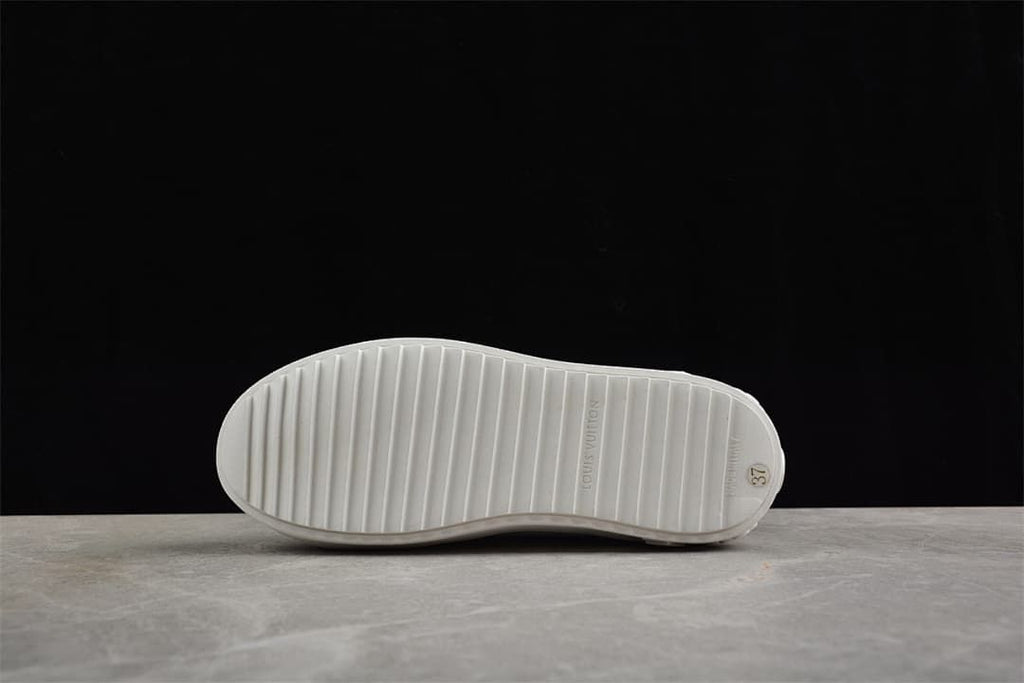 Outsole view with a visible size 37 marking