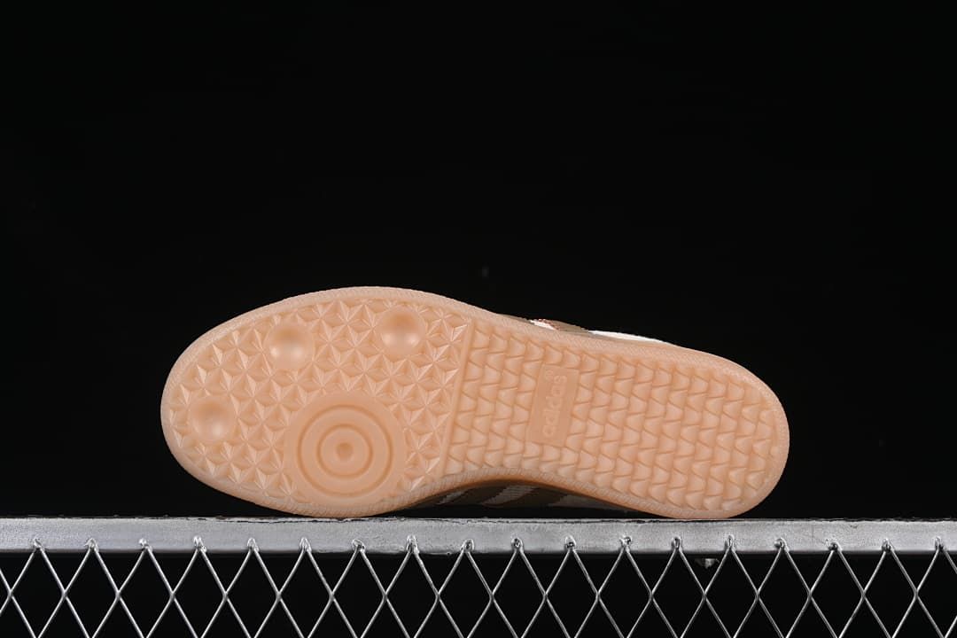 Underside of the gum-colored outsole with patterned tread